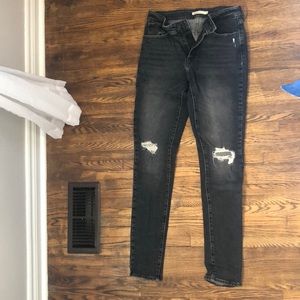 Levis Women’s Black 721 High Rise Skinny Distressed Jeans